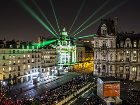 a drone photo of the BHV building in Paris Hotel de Ville during the video mapping show th celebrate the 160th anniversary