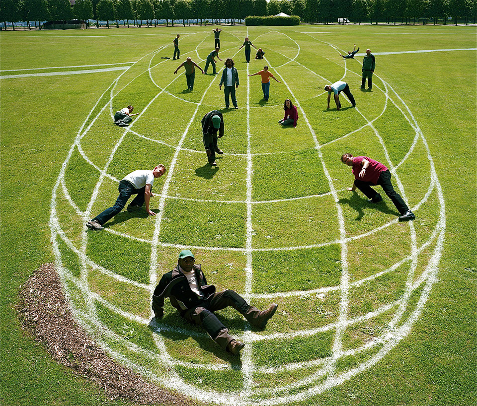 a 3d shere in anamorphosis on the ground at the parc of Saint Germain en Laye, France